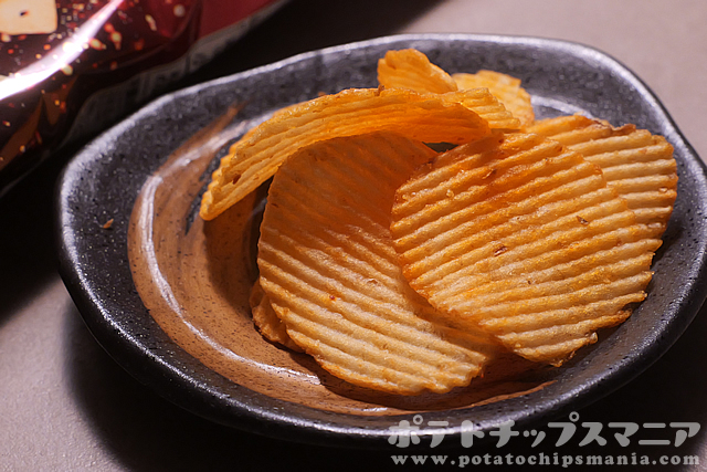 カルビー ポテトチップス 濃厚キング 旨辛ゴッドチリ味の味